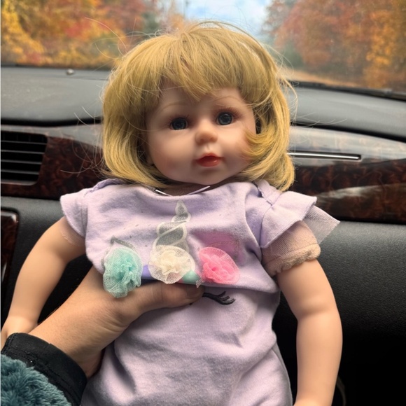 NPK collection Other - REBORN toddler doll features soft blonde hair and a lavender outfit, perfe